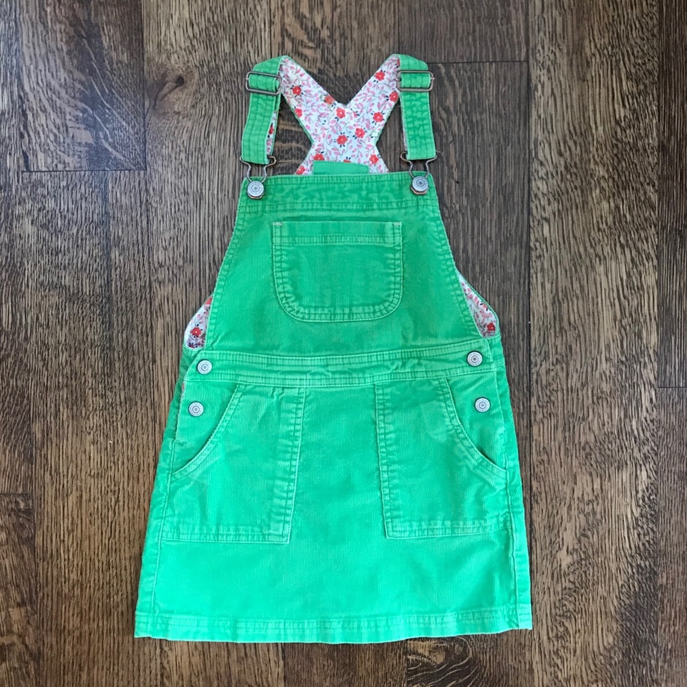 Darling corduroy dungaree dress by Mini Boden